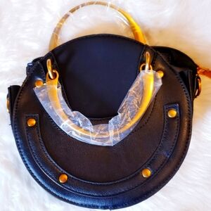 Black and gold oval mini cross body boho bag